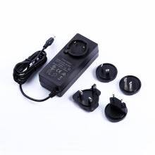 Interchangeable Plug Adapter EU/Us/UK/Au/Cn Standard 12V 5A Power Supply